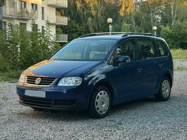 Синій Фольксваген Туран, об'ємом двигуна 2 л та пробігом 340 тис. км за 3009 $, фото 1 на Automoto.ua