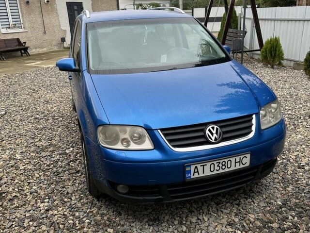 Синий Фольксваген Туран, объемом двигателя 2 л и пробегом 490 тыс. км за 4300 $, фото 1 на Automoto.ua