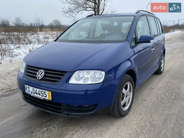 Синій Фольксваген Туран, об'ємом двигуна 1.6 л та пробігом 219 тис. км за 5450 $, фото 1 на Automoto.ua