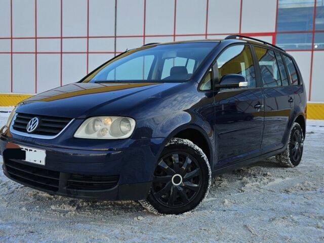 Синий Фольксваген Туран, объемом двигателя 2 л и пробегом 297 тыс. км за 2457 $, фото 1 на Automoto.ua