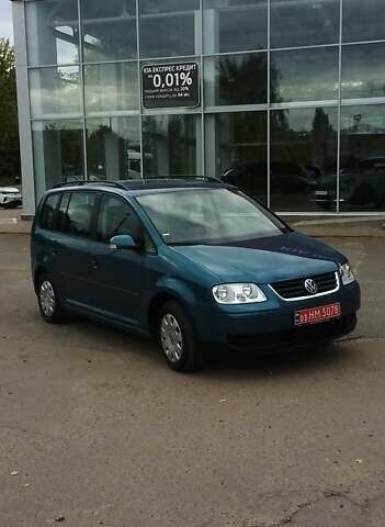 Синий Фольксваген Туран, объемом двигателя 1.6 л и пробегом 180 тыс. км за 6500 $, фото 1 на Automoto.ua