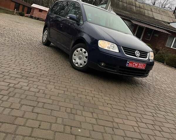 Синий Фольксваген Туран, объемом двигателя 1.6 л и пробегом 204 тыс. км за 6200 $, фото 1 на Automoto.ua