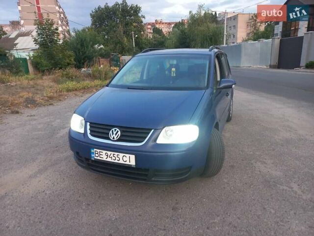 Синий Фольксваген Туран, объемом двигателя 2 л и пробегом 312 тыс. км за 7200 $, фото 1 на Automoto.ua