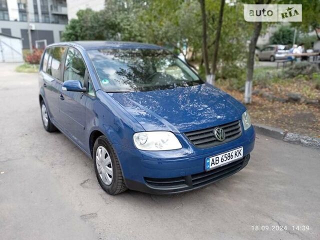 Синий Фольксваген Туран, объемом двигателя 1.6 л и пробегом 209 тыс. км за 5000 $, фото 1 на Automoto.ua