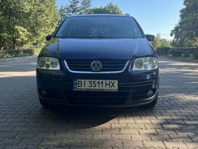 Синий Фольксваген Туран, объемом двигателя 1.6 л и пробегом 270 тыс. км за 6000 $, фото 1 на Automoto.ua