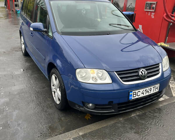 Синій Фольксваген Туран, об'ємом двигуна 1.6 л та пробігом 160 тис. км за 7300 $, фото 1 на Automoto.ua