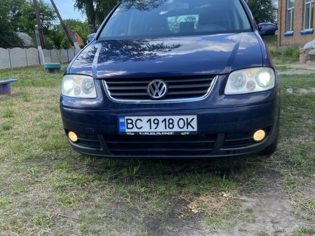 Синій Фольксваген Туран, об'ємом двигуна 2 л та пробігом 316 тис. км за 6000 $, фото 1 на Automoto.ua