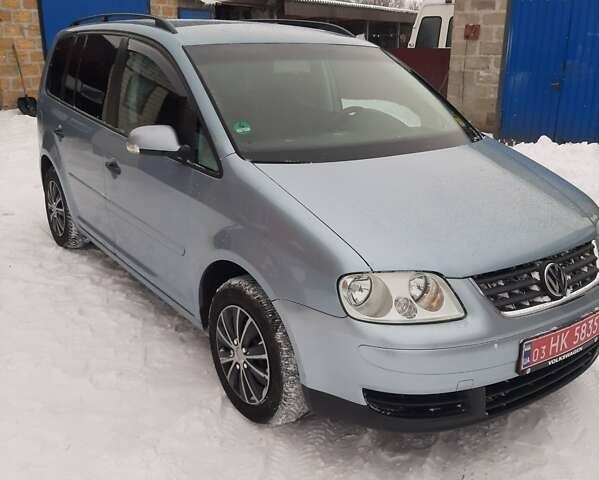 Синий Фольксваген Туран, объемом двигателя 1.6 л и пробегом 233 тыс. км за 5600 $, фото 1 на Automoto.ua