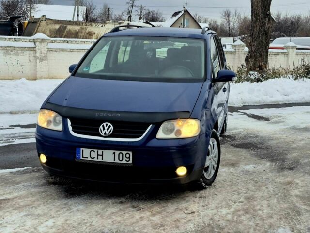 Синий Фольксваген Туран, объемом двигателя 2 л и пробегом 234 тыс. км за 2450 $, фото 1 на Automoto.ua
