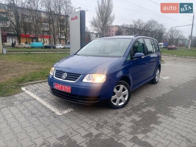 Синий Фольксваген Туран, объемом двигателя 1.6 л и пробегом 189 тыс. км за 6850 $, фото 1 на Automoto.ua