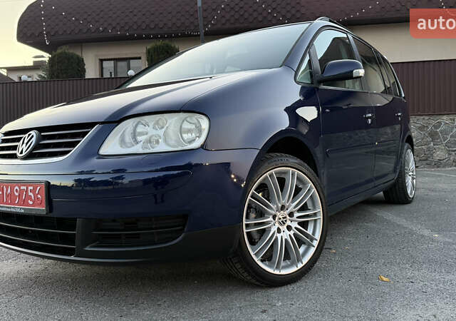 Синій Фольксваген Туран, об'ємом двигуна 1.6 л та пробігом 282 тис. км за 6500 $, фото 1 на Automoto.ua