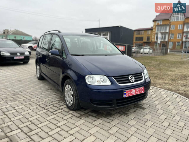Синий Фольксваген Туран, объемом двигателя 1.6 л и пробегом 211 тыс. км за 5700 $, фото 1 на Automoto.ua