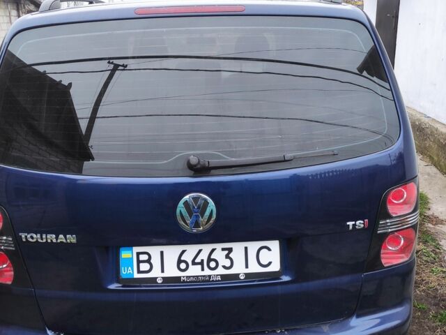 Синій Фольксваген Туран, об'ємом двигуна 1.4 л та пробігом 244 тис. км за 5500 $, фото 1 на Automoto.ua