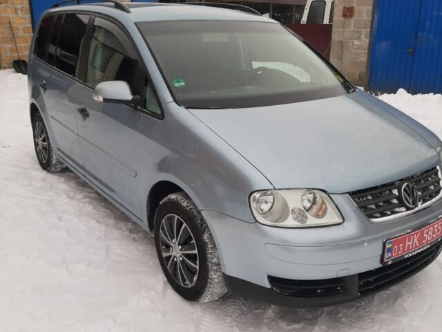 Синий Фольксваген Туран, объемом двигателя 1.6 л и пробегом 233 тыс. км за 5600 $, фото 1 на Automoto.ua