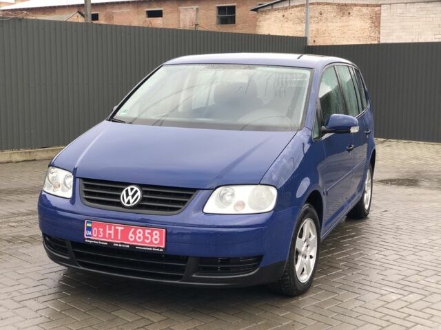 Синій Фольксваген Туран, об'ємом двигуна 1.5 л та пробігом 252 тис. км за 5400 $, фото 1 на Automoto.ua