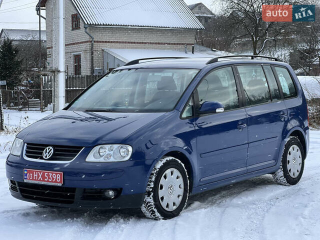 Синій Фольксваген Туран, об'ємом двигуна 1.6 л та пробігом 170 тис. км за 5800 $, фото 1 на Automoto.ua