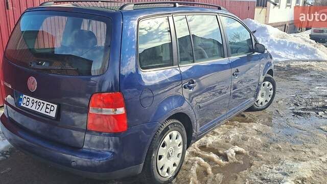 Синій Фольксваген Туран, об'ємом двигуна 1.6 л та пробігом 254 тис. км за 6300 $, фото 1 на Automoto.ua