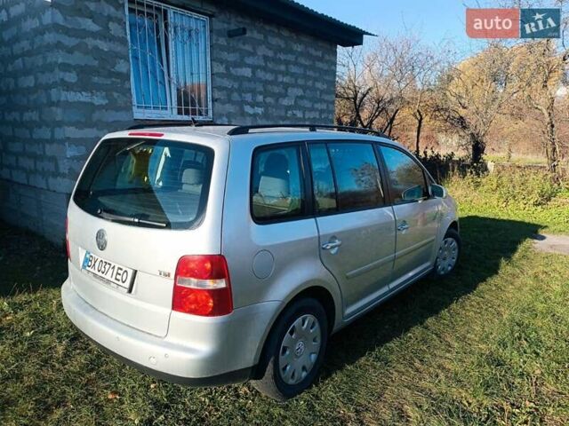 Синий Фольксваген Туран, объемом двигателя 1.4 л и пробегом 233 тыс. км за 5799 $, фото 1 на Automoto.ua