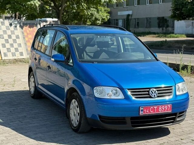 Синій Фольксваген Туран, об'ємом двигуна 1.6 л та пробігом 211 тис. км за 5000 $, фото 1 на Automoto.ua