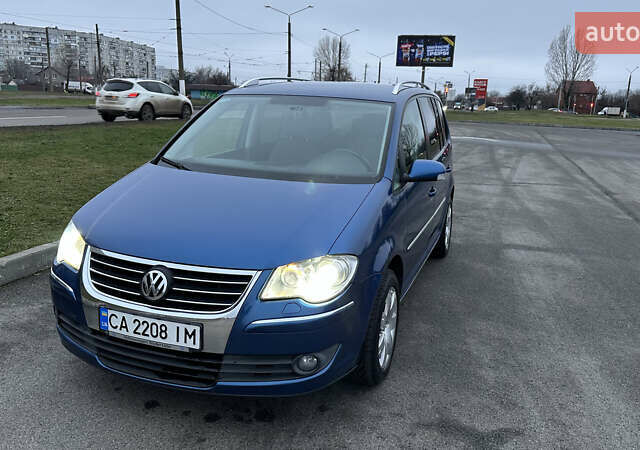 Синій Фольксваген Туран, об'ємом двигуна 1.4 л та пробігом 223 тис. км за 6999 $, фото 1 на Automoto.ua
