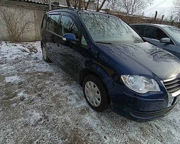 Синій Фольксваген Туран, об'ємом двигуна 1.39 л та пробігом 232 тис. км за 7200 $, фото 1 на Automoto.ua