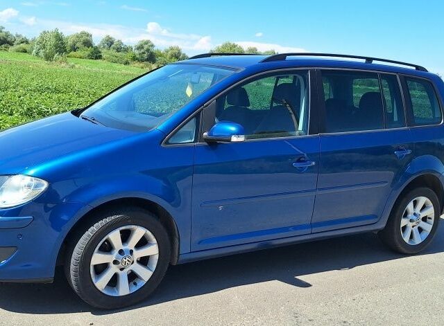 Синій Фольксваген Туран, об'ємом двигуна 1.9 л та пробігом 250 тис. км за 7300 $, фото 1 на Automoto.ua