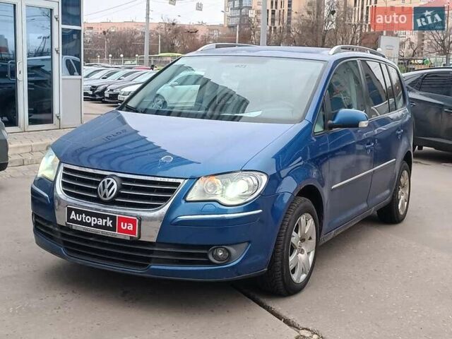 Синий Фольксваген Туран, объемом двигателя 1.4 л и пробегом 224 тыс. км за 6490 $, фото 1 на Automoto.ua