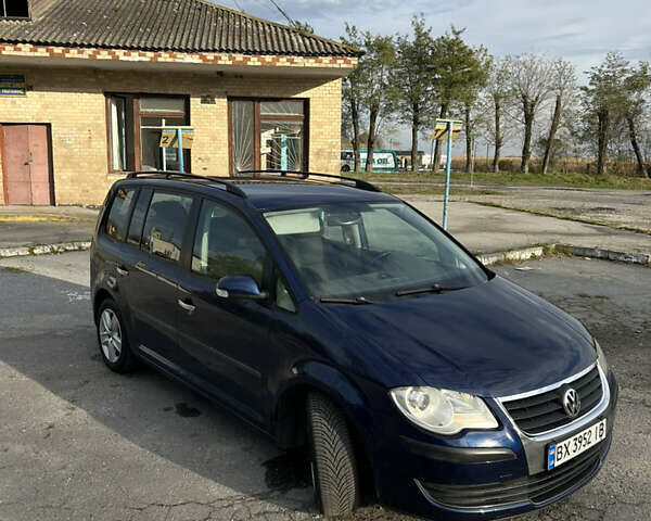 Синий Фольксваген Туран, объемом двигателя 1.4 л и пробегом 237 тыс. км за 6000 $, фото 1 на Automoto.ua