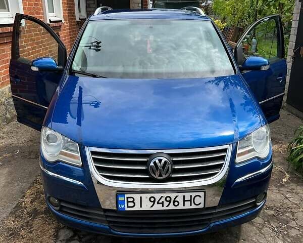 Синий Фольксваген Туран, объемом двигателя 1.4 л и пробегом 192 тыс. км за 6700 $, фото 1 на Automoto.ua