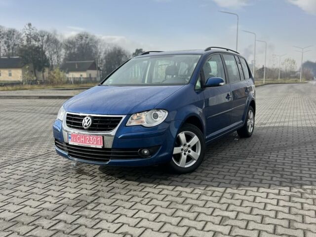 Синій Фольксваген Туран, об'ємом двигуна 1.4 л та пробігом 208 тис. км за 6899 $, фото 1 на Automoto.ua