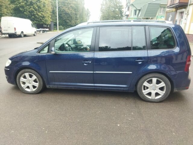 Синий Фольксваген Туран, объемом двигателя 2 л и пробегом 244 тыс. км за 5350 $, фото 1 на Automoto.ua