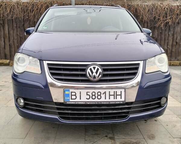 Синий Фольксваген Туран, объемом двигателя 1.39 л и пробегом 230 тыс. км за 6800 $, фото 1 на Automoto.ua
