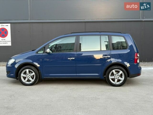 Синий Фольксваген Туран, объемом двигателя 1.39 л и пробегом 253 тыс. км за 5850 $, фото 1 на Automoto.ua