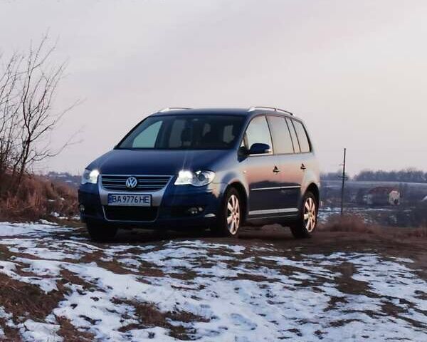 Синий Фольксваген Туран, объемом двигателя 1.4 л и пробегом 160 тыс. км за 9000 $, фото 1 на Automoto.ua