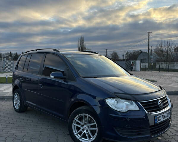 Синій Фольксваген Туран, об'ємом двигуна 1.97 л та пробігом 393 тис. км за 7300 $, фото 1 на Automoto.ua