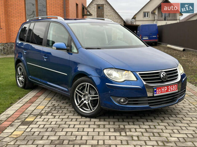 Синий Фольксваген Туран, объемом двигателя 1.4 л и пробегом 191 тыс. км за 7500 $, фото 1 на Automoto.ua