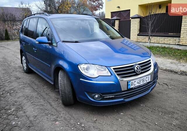 Синій Фольксваген Туран, об'ємом двигуна 2 л та пробігом 358 тис. км за 7500 $, фото 1 на Automoto.ua