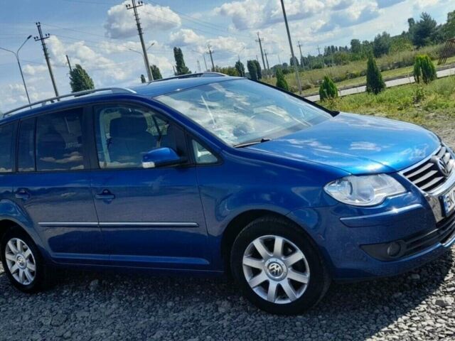 Синій Фольксваген Туран, об'ємом двигуна 1.98 л та пробігом 210 тис. км за 6942 $, фото 1 на Automoto.ua