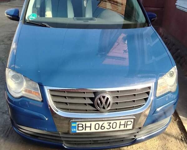 Синий Фольксваген Туран, объемом двигателя 1.39 л и пробегом 185 тыс. км за 6500 $, фото 1 на Automoto.ua