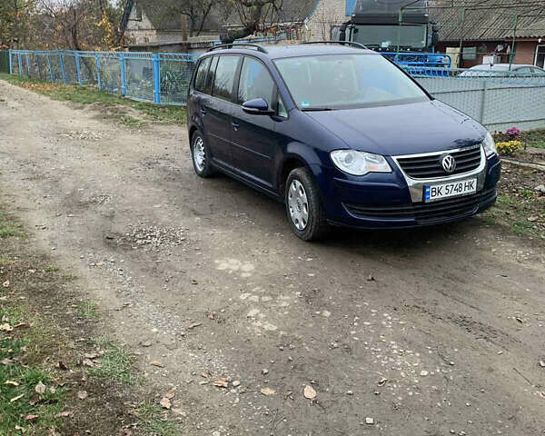 Синий Фольксваген Туран, объемом двигателя 1.39 л и пробегом 190 тыс. км за 6500 $, фото 1 на Automoto.ua