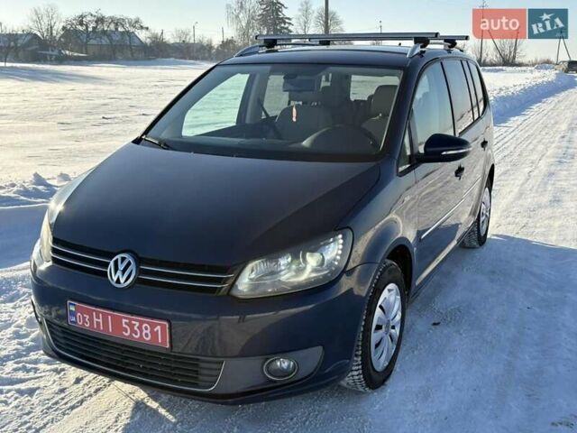 Синий Фольксваген Туран, объемом двигателя 1.2 л и пробегом 246 тыс. км за 8200 $, фото 1 на Automoto.ua