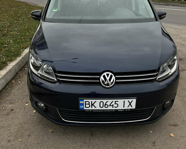 Синій Фольксваген Туран, об'ємом двигуна 1.6 л та пробігом 233 тис. км за 12100 $, фото 1 на Automoto.ua