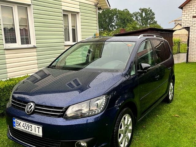 Синий Фольксваген Туран, объемом двигателя 2 л и пробегом 253 тыс. км за 11500 $, фото 1 на Automoto.ua