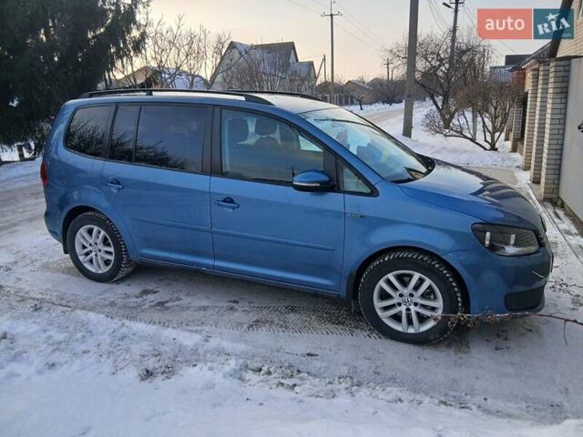 Синий Фольксваген Туран, объемом двигателя 1.6 л и пробегом 170 тыс. км за 8900 $, фото 1 на Automoto.ua