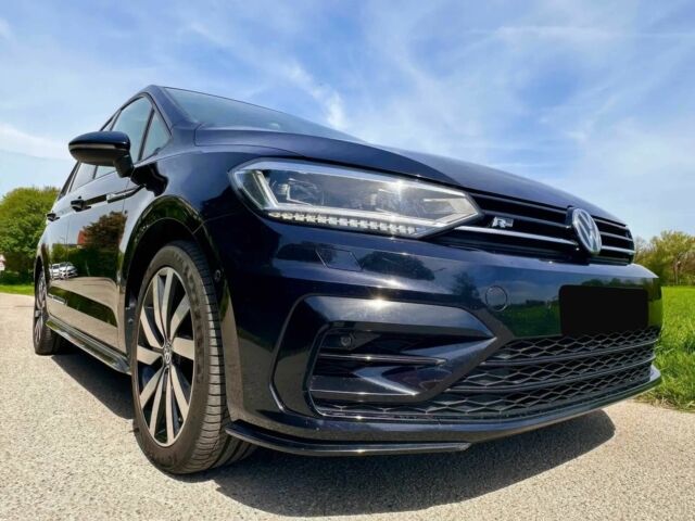 Синій Фольксваген Туран, об'ємом двигуна 2 л та пробігом 33 тис. км за 8400 $, фото 1 на Automoto.ua