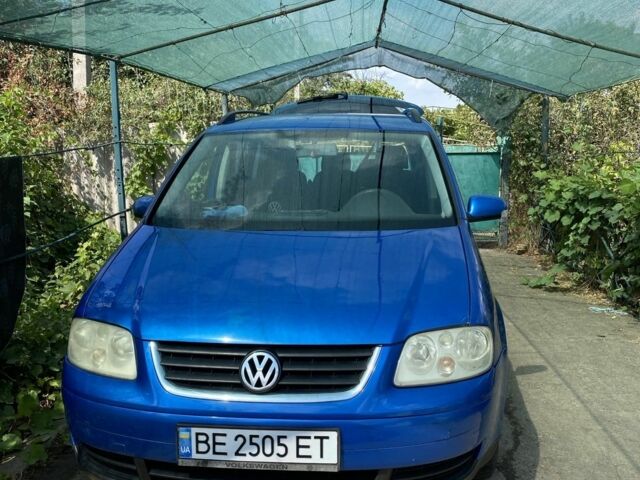 Синий Фольксваген Туран, объемом двигателя 1.6 л и пробегом 270 тыс. км за 5400 $, фото 1 на Automoto.ua