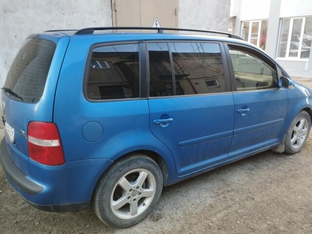 Синій Фольксваген Туран, об'ємом двигуна 1.9 л та пробігом 240 тис. км за 4800 $, фото 1 на Automoto.ua