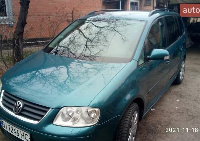 Зеленый Фольксваген Туран, объемом двигателя 1.9 л и пробегом 328 тыс. км за 6000 $, фото 1 на Automoto.ua