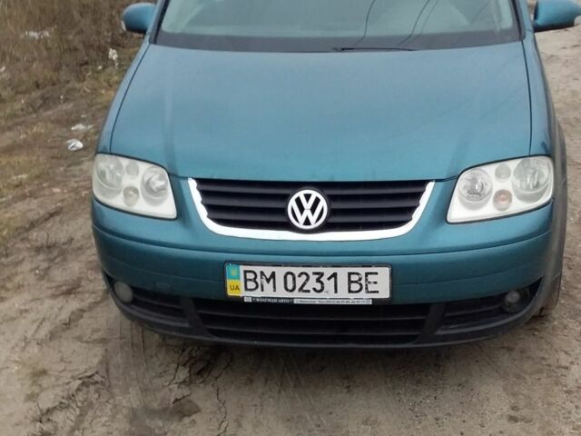 Зеленый Фольксваген Туран, объемом двигателя 2 л и пробегом 200 тыс. км за 4199 $, фото 1 на Automoto.ua