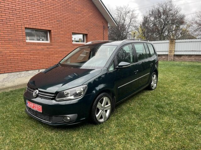 Зеленый Фольксваген Туран, объемом двигателя 2 л и пробегом 282 тыс. км за 10700 $, фото 1 на Automoto.ua